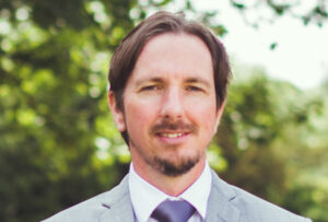 Stuart-Cole-Website-Consultant Stuart Cole, founder of Stuart Cole Consulting, outdoors in Cheltenham