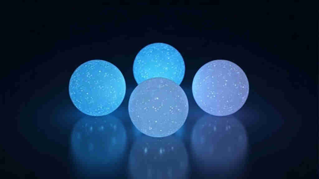 Four glowing spheres arranged in a square representing four AI companies